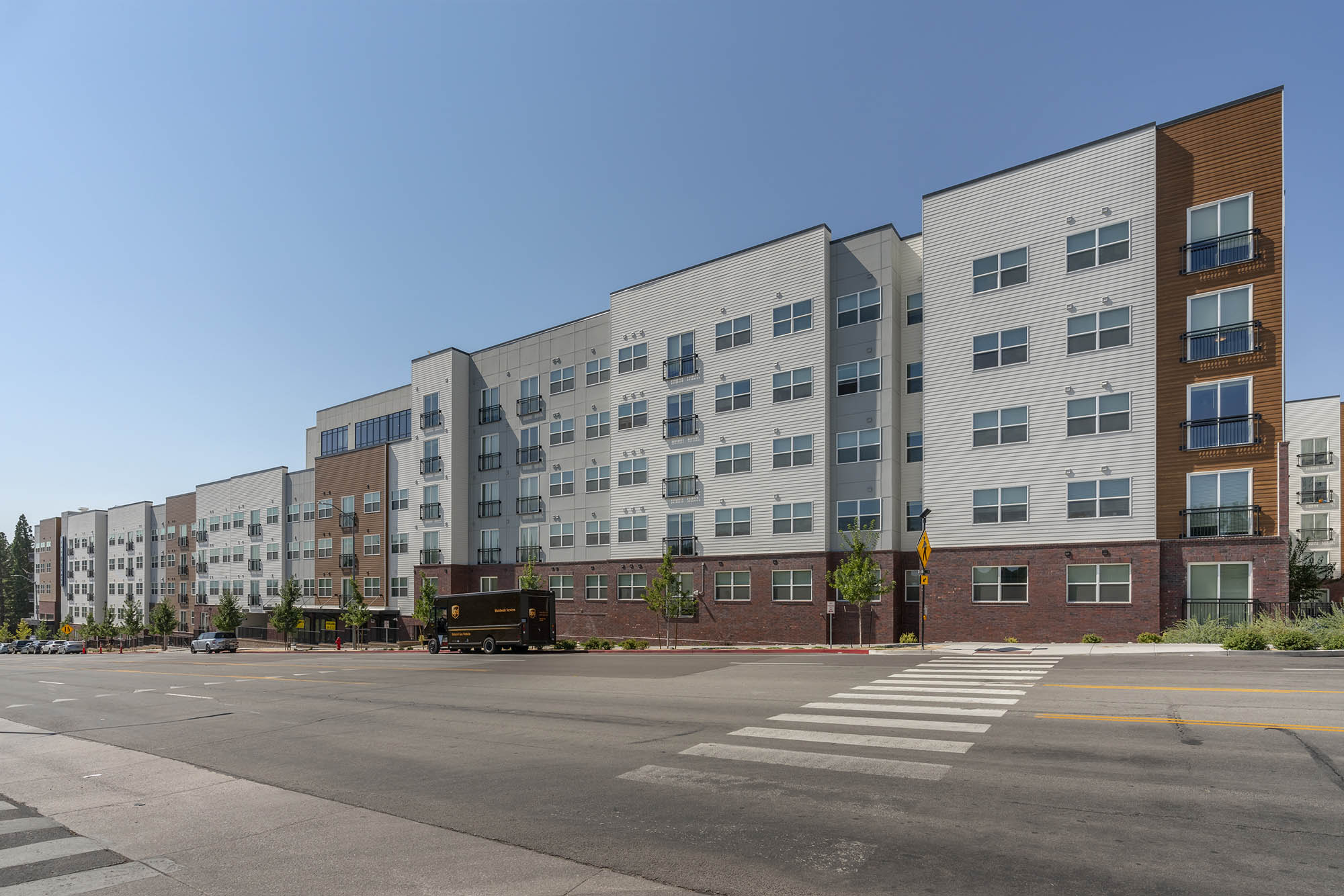 Modern apartment building with multiple floors and balconies