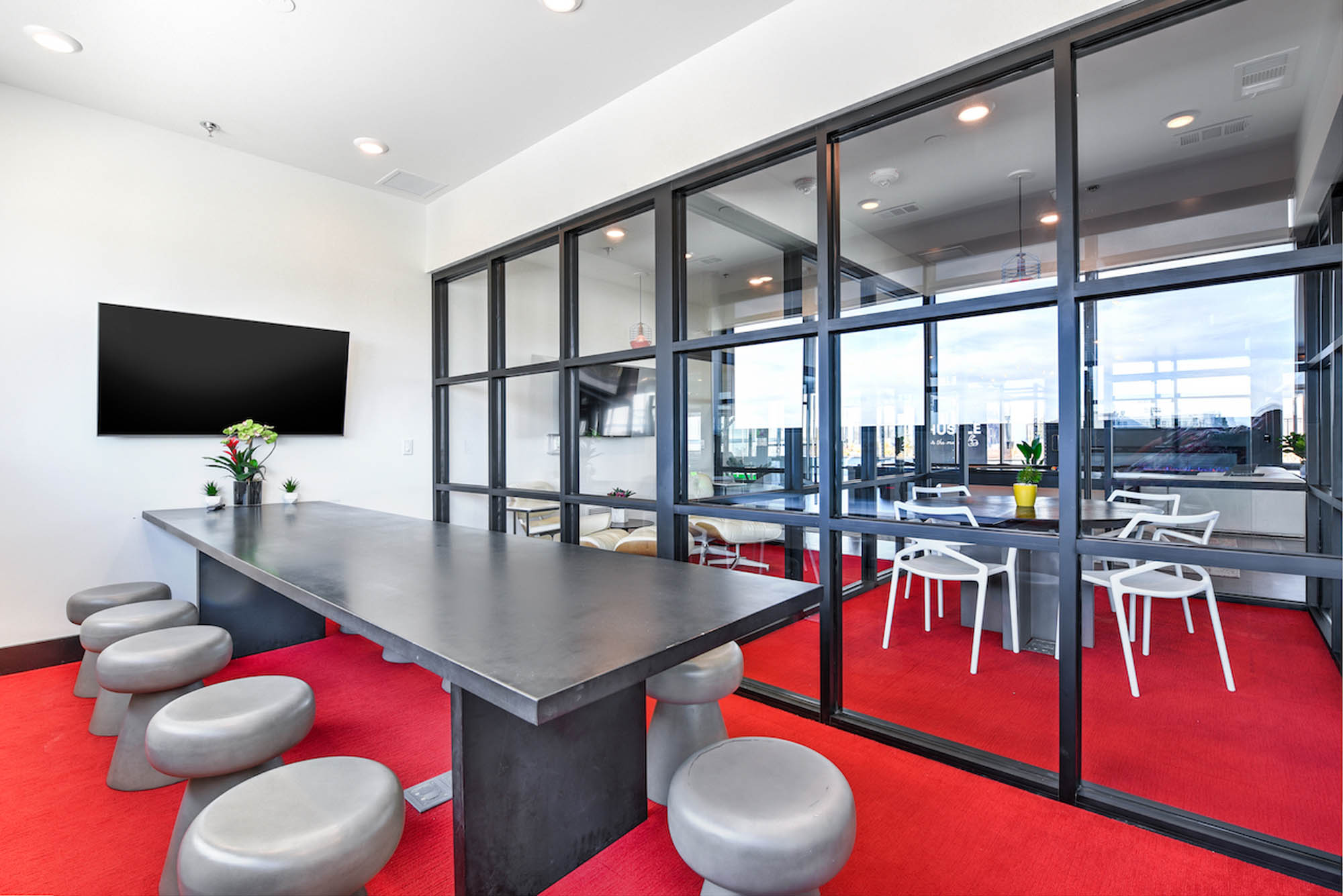 Modern conference room with a large table and chairs