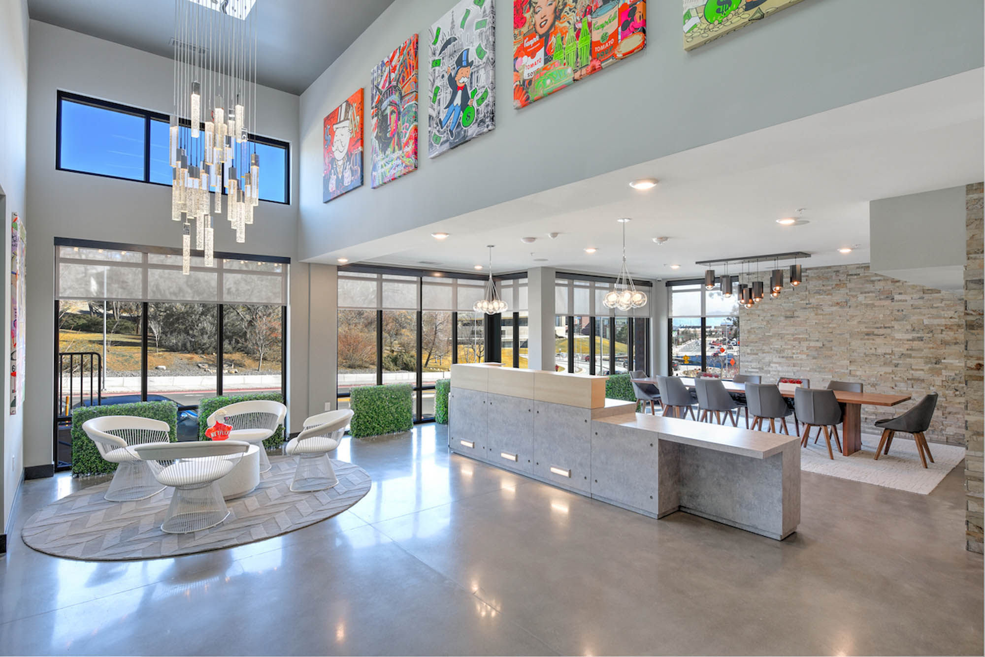 Modern leasing office with seating artwork and large windows