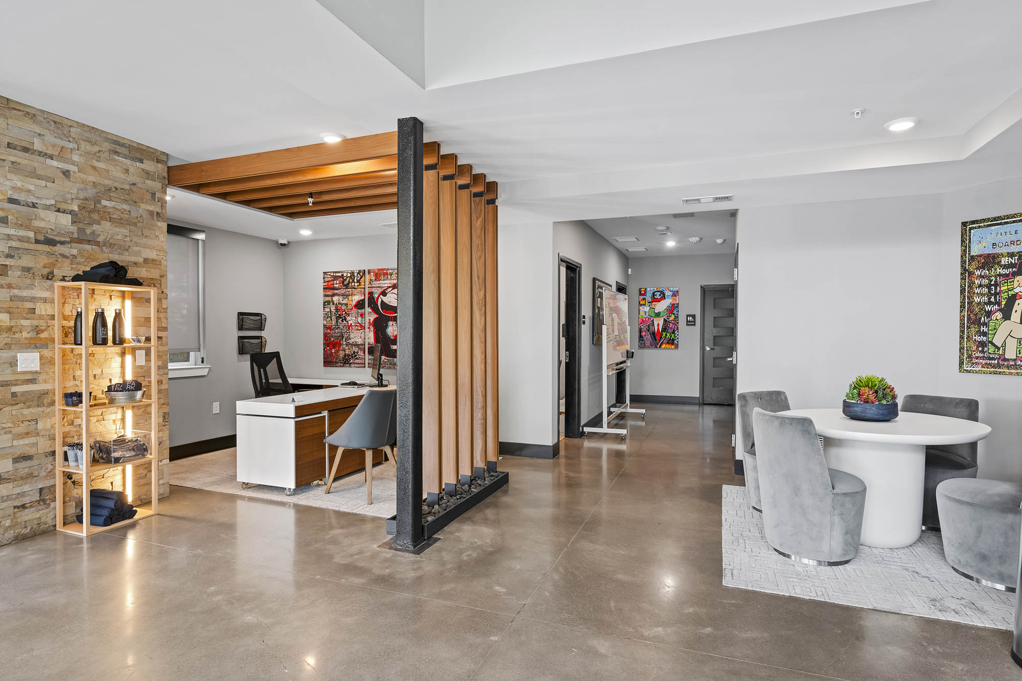 Modern office lobby with seating artwork and wood accents