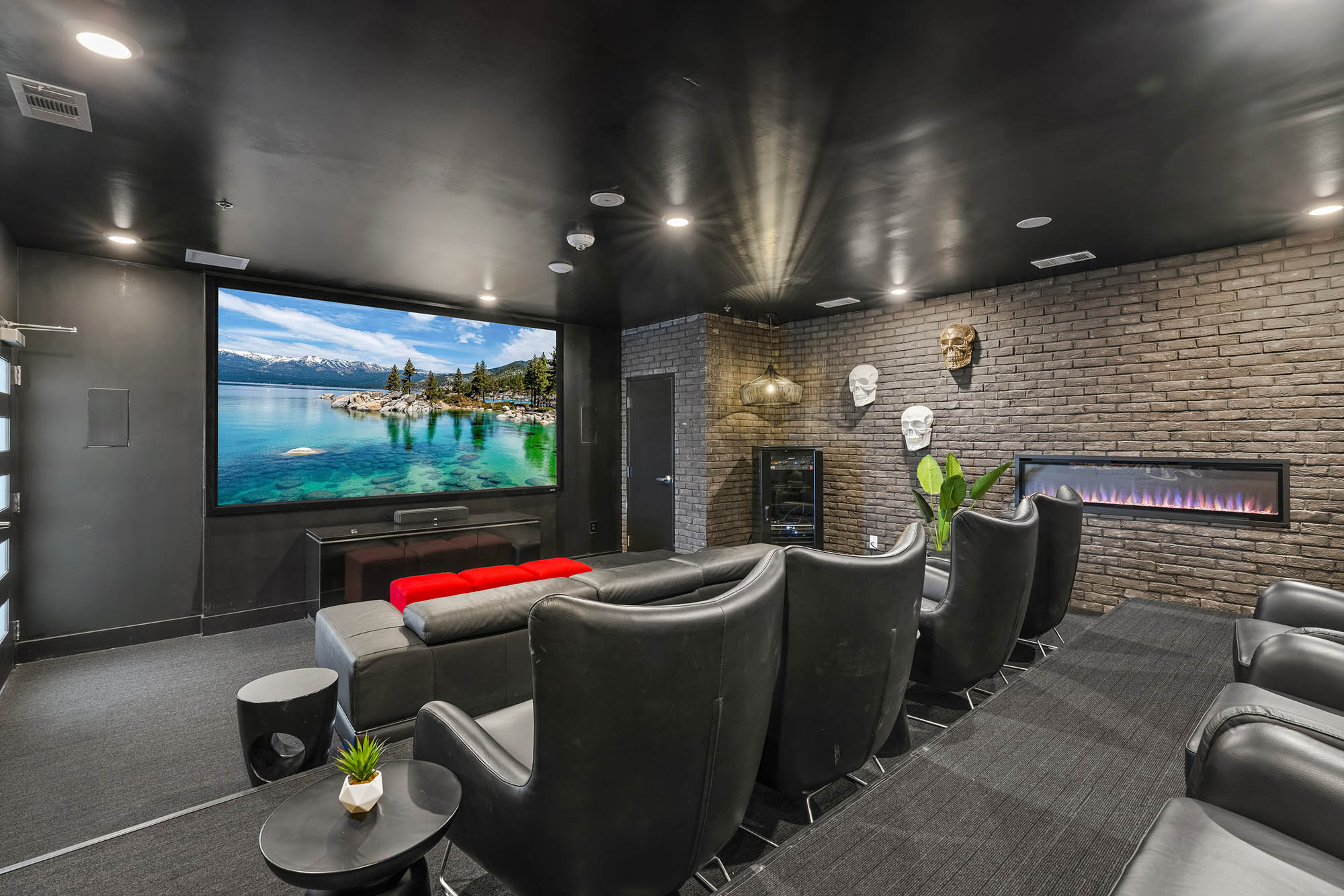 modern home theater featuring a large screen displ