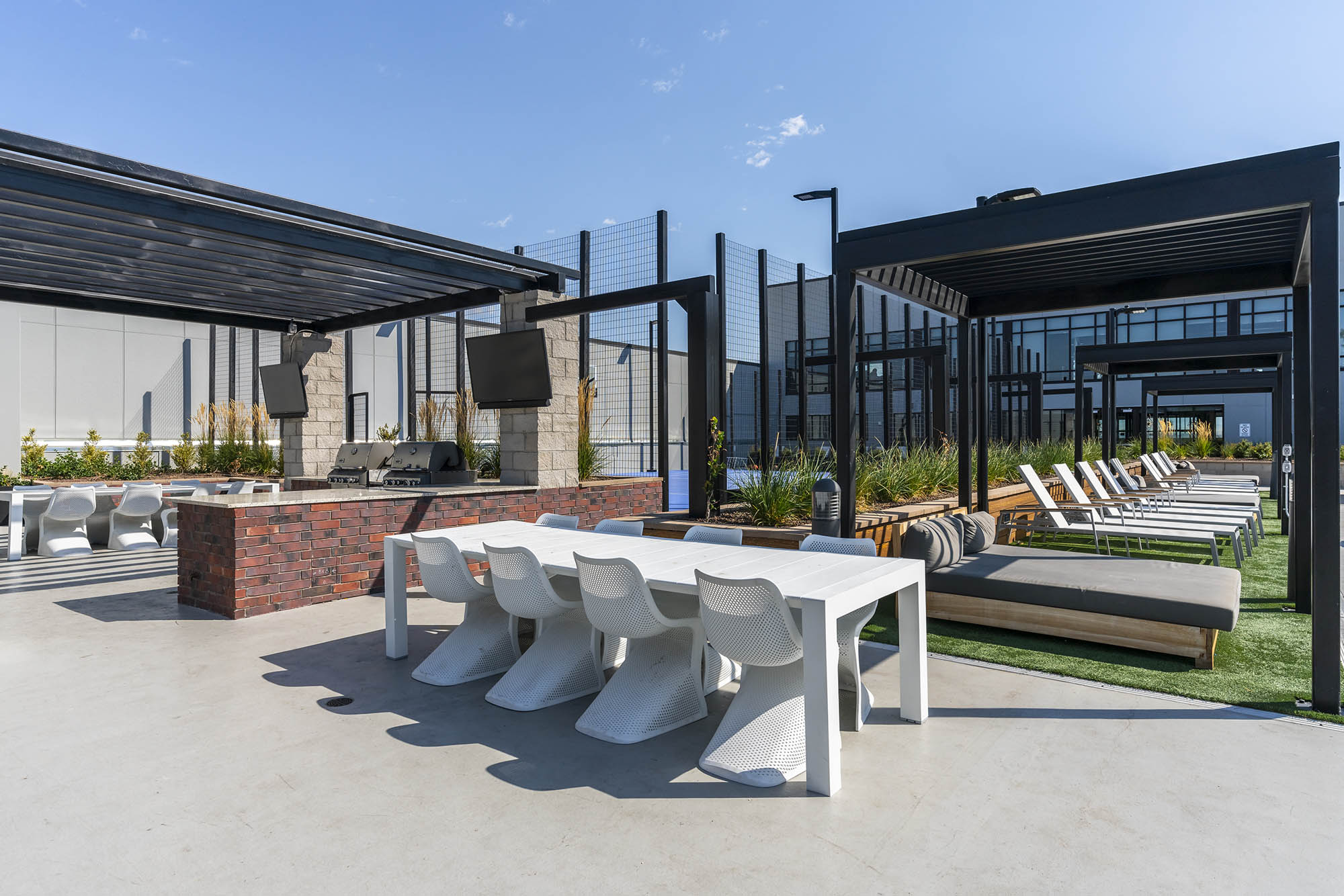 modern outdoor lounge area with white furniture s