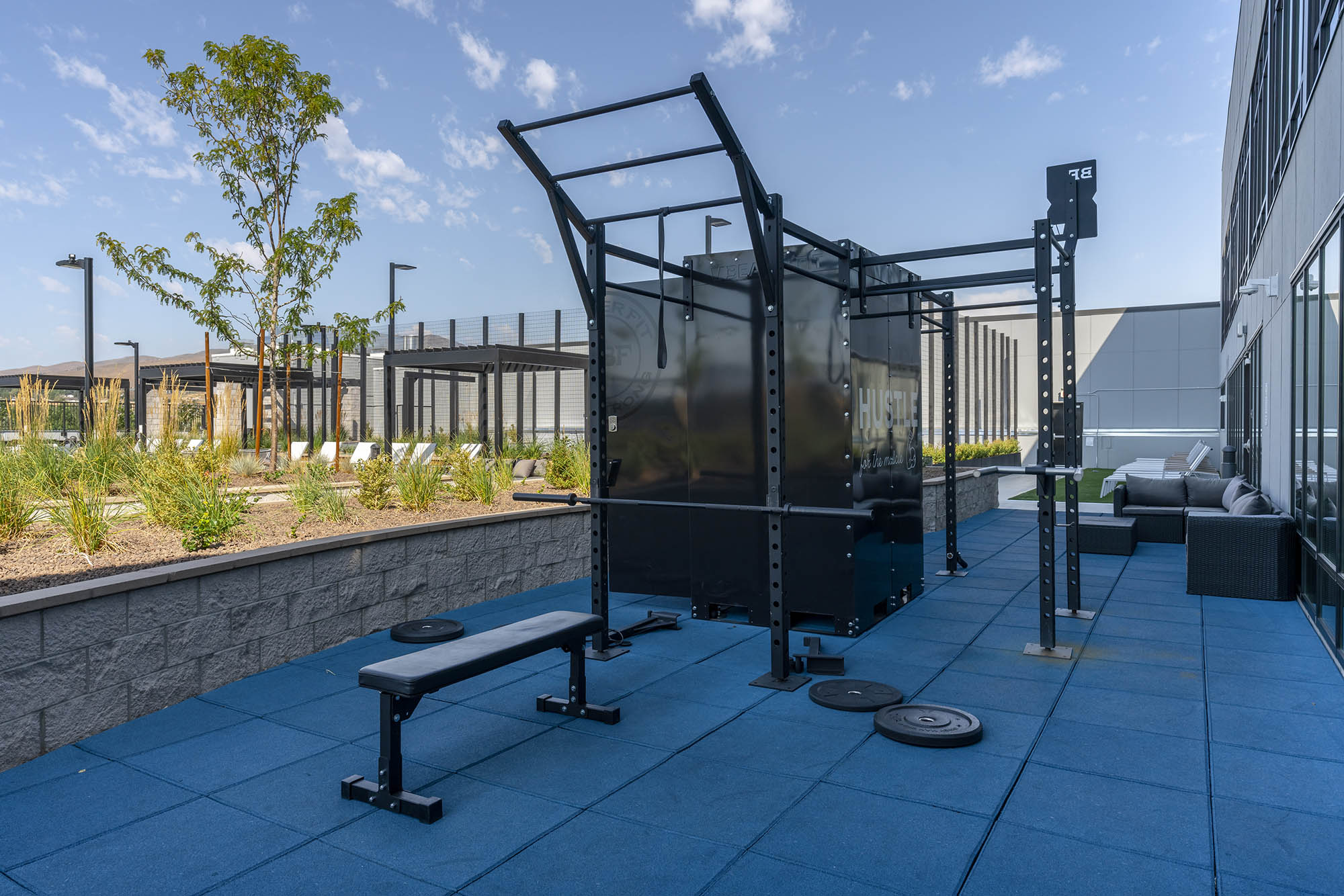 outdoor gym area featuring a black workout station